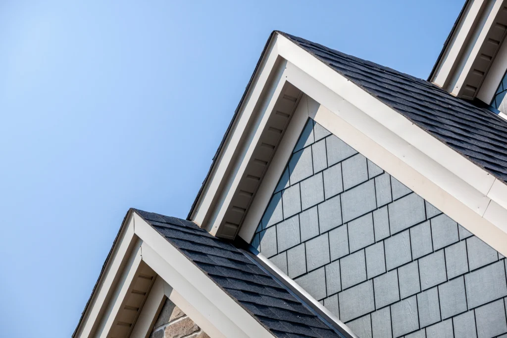 gable roof with emergency roof repair on shingles after storm