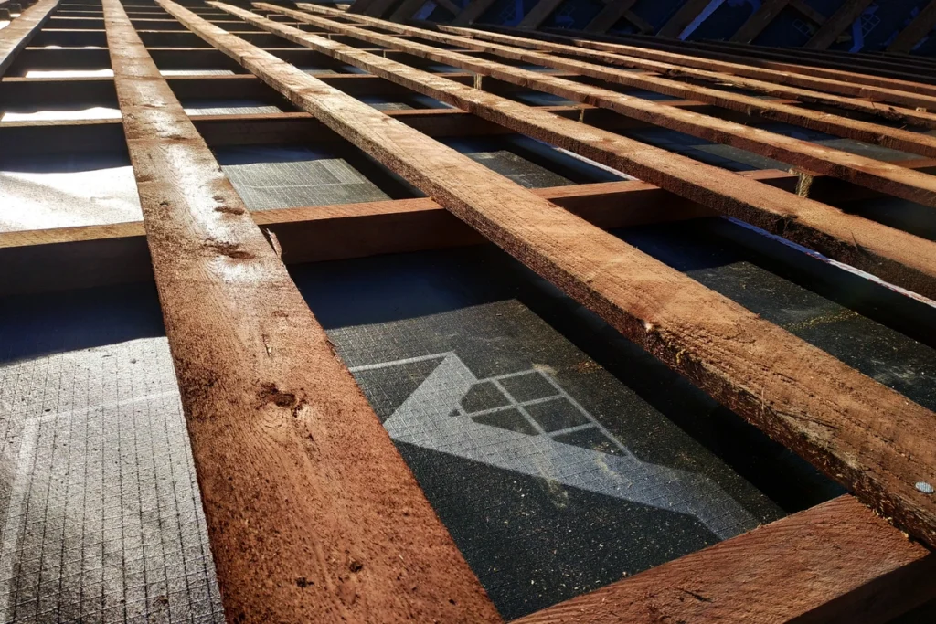 roof underlayment under wood panels
