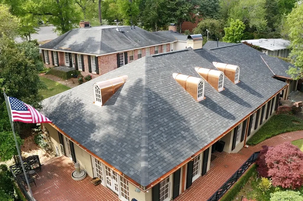 Roof inspection performed by I AM Roofing featuring a detailed evaluation of a residential asphalt shingle roof in Alabama