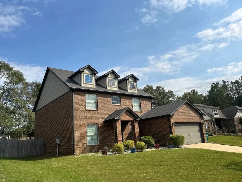 New shingle roof on a two-story brick home in Montgomery, AL