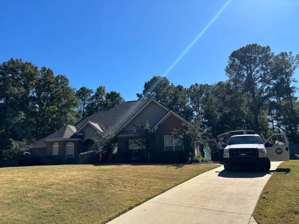 Residential roof on a brick home in Prattville, AL serviced by I AM Roofing